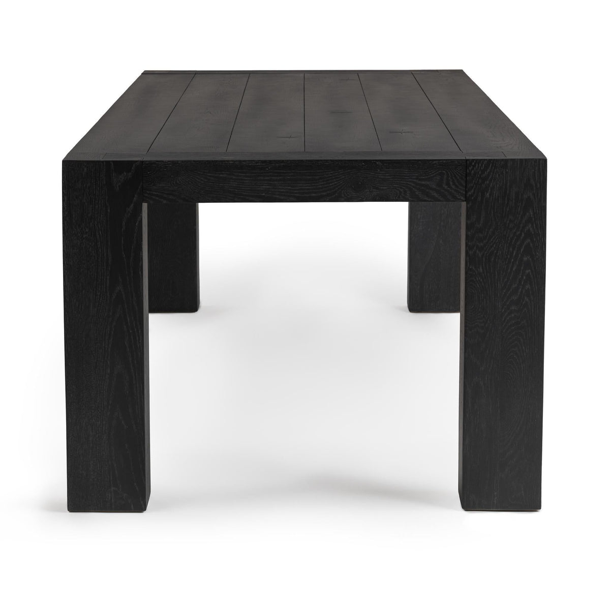 Classic Home Bristol dining table with wooden surface and sturdy legs, ideal for modern or traditional dining rooms.