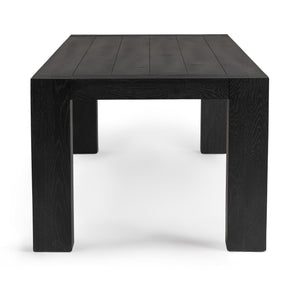Classic Home Bristol dining table with wooden surface and sturdy legs, ideal for modern or traditional dining rooms.