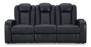 Signature Design by Ashley Fyne-dyme power reclining sofa with adjustable headrest, featuring plush cushions and modern style.