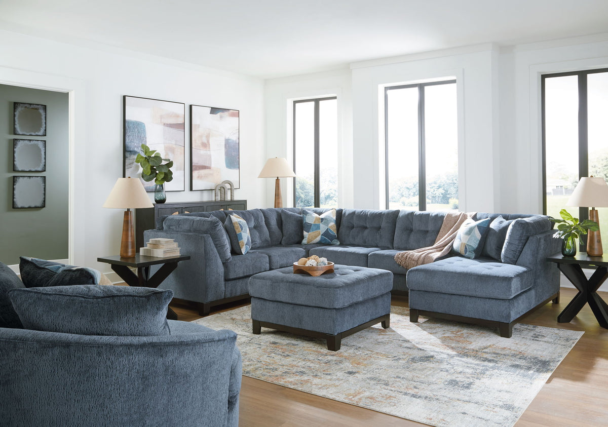 Benchcraft Maxon Place 5-piece living room set featuring a sofa, loveseat, armchair, and matching ottomans in a stylish living space.