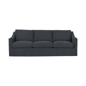Classic Home Kipton upholstered stationary sofa with plush fabric and comfortable cushions in a modern living room setting.