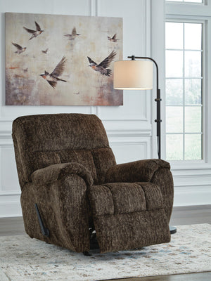 Signature Design by Ashley Stayfish rocker recliner with plush upholstery and wooden base, showcasing a comfortable, modern rocking chair.
