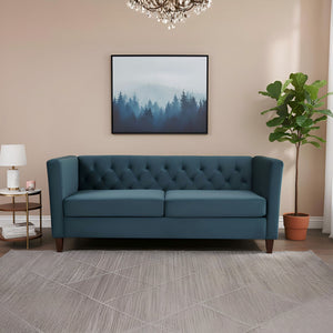 Navy blue US Pride button tufted 3-seater sofa with upholstered cushions and wooden legs, designed for a stylish living room.