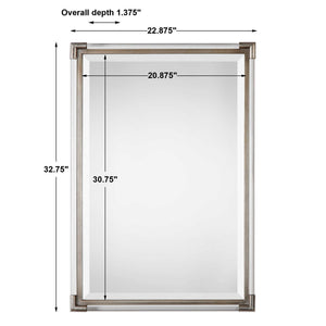 Silver metallic wall mirror by Uttermost, Mackai style, with a sleek, reflective surface and modern design.