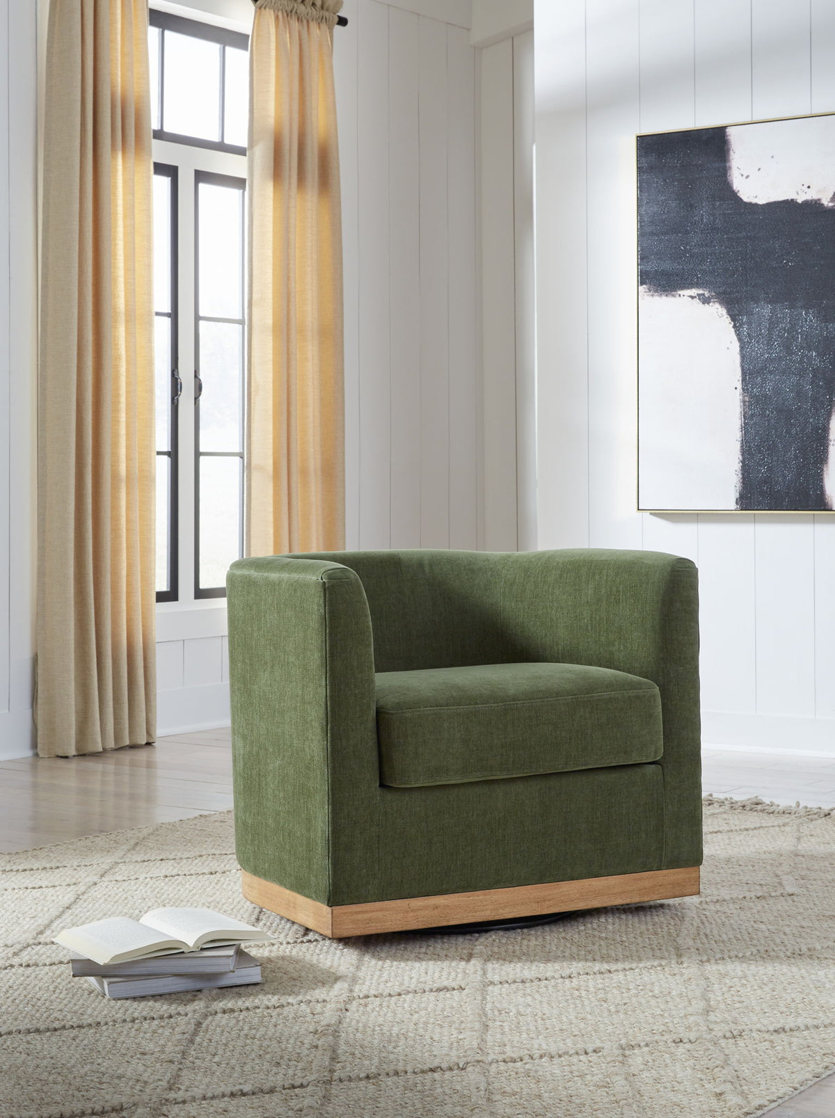 Forest green Jersonlow swivel chair by Signature Design Ashley featuring a cushioned seat and modern design.