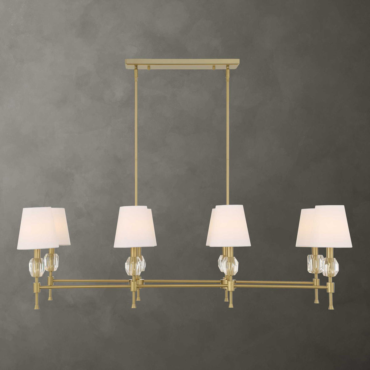 Uttermost Arques 8-light linear chandelier with white and gold finish, featuring sleek modern design and elegant lighting.