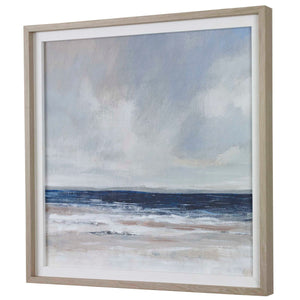 Uttermost Distant Land framed print featuring blue landscape artwork, displayed in a sleek frame.