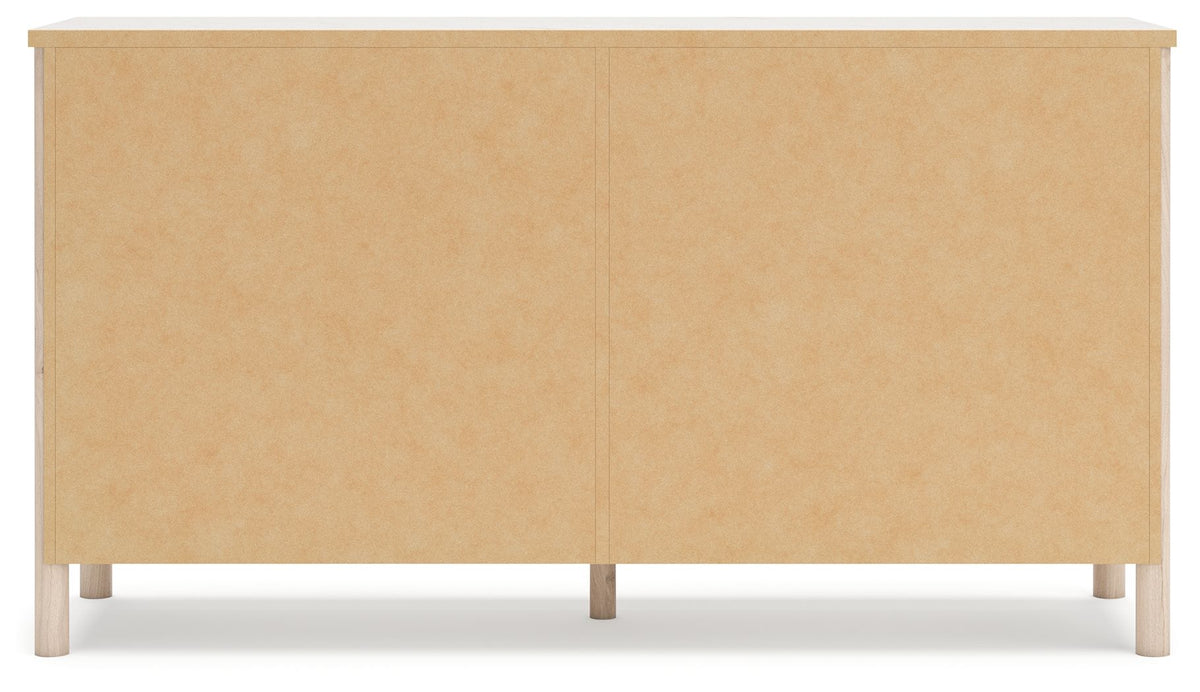Signature Design by Ashley Cadmori six drawer dresser with sleek wood finish and modern hardware, showcasing ample storage space.