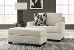 Benchcraft® Heartcort living room set with stationary chair and matching ottoman in a cozy, modern design.
