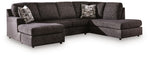 Signature Design by Ashley Lentiz stationary sectional sofa with plush cushions and a modern design for comfortable living space.