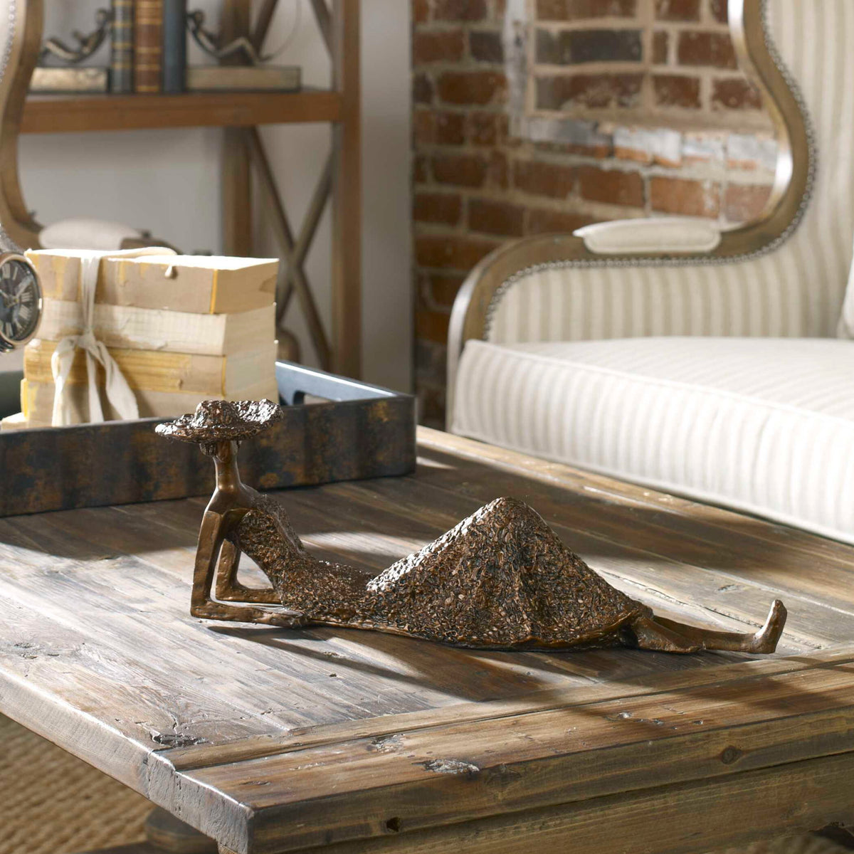Antique bronze "Summer Days" sculpture by Uttermost, decorative figurine with detailed summer-themed design, suitable for home decor.