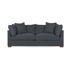 Classic Home Audrey stationary sofa with plush cushions and elegant design, showcased in a cozy living room setting.