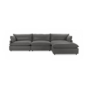 Classic Home Caplan modular sectional sofa with plush cushions and modern design, shown in a stylish living room setting.