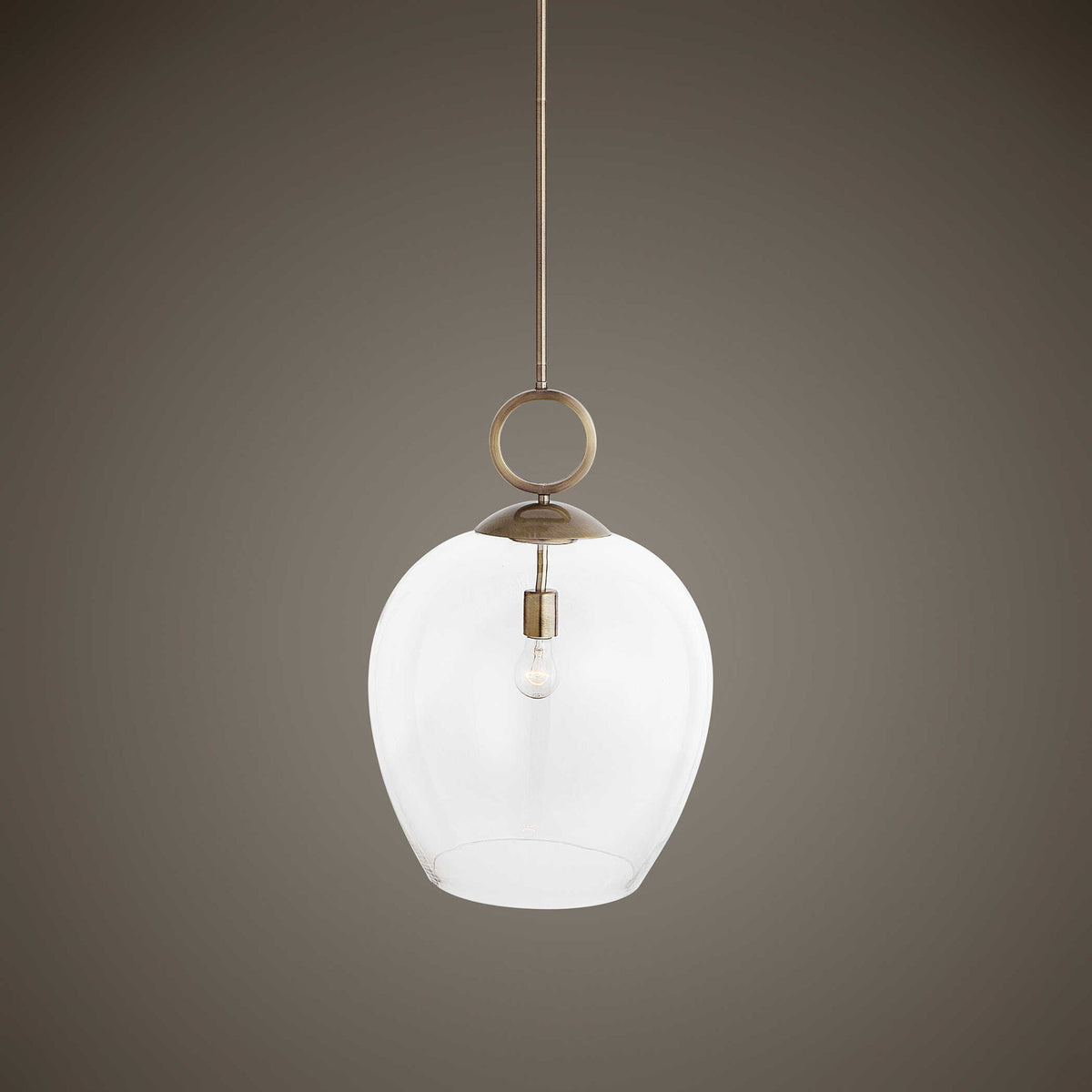 Large white blown glass pendant light by Uttermost, featuring a sleek 1-light pendant lighting design for modern interiors.