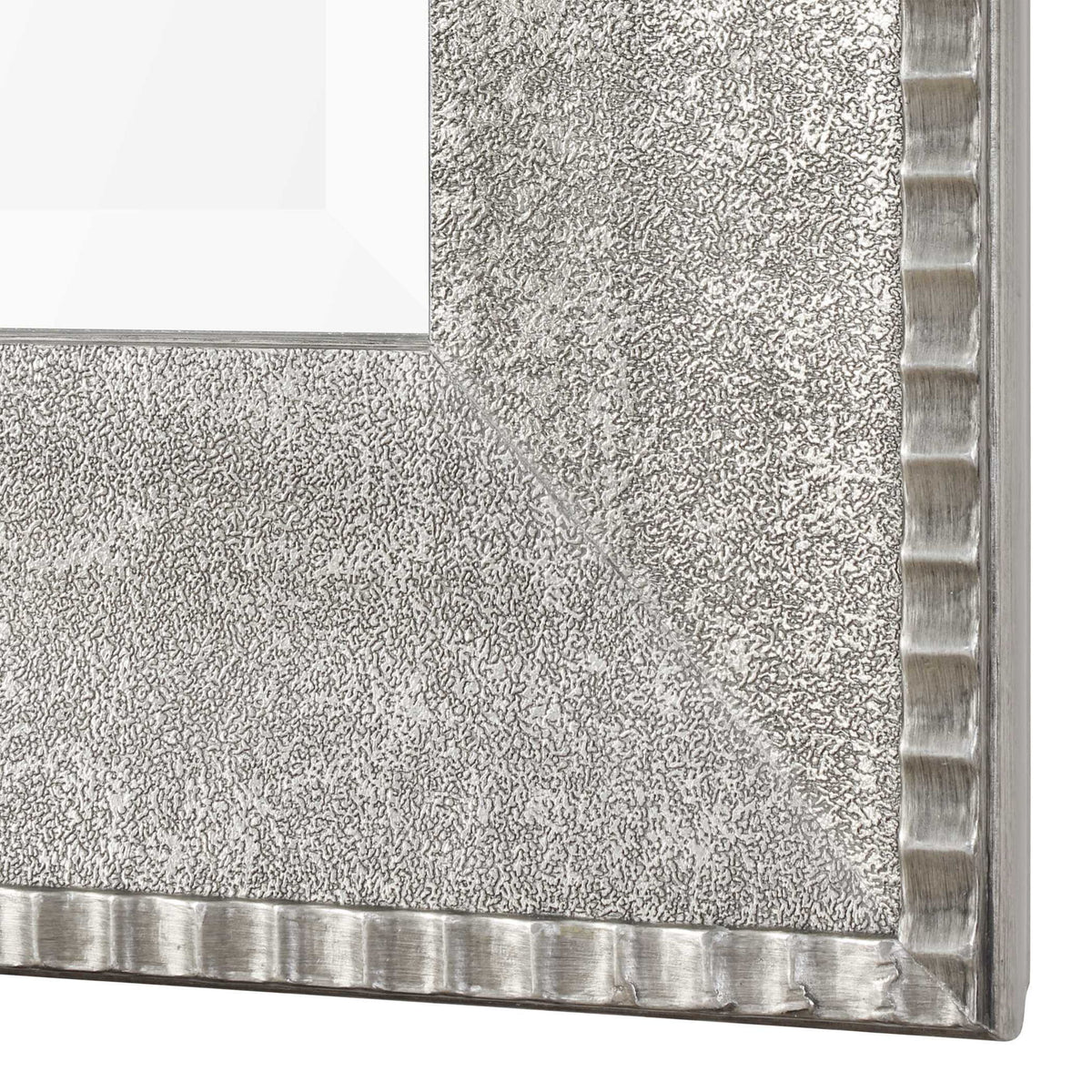 Silver Leiston metallic wall mirror by Uttermost featuring a sleek, reflective surface and modern design.