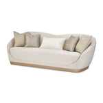 Michael Amini La Rachelle stationary sofa with plush fabric, elegant design, and cushioned armrests in a stylish living room setting.