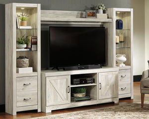 Bellaby entertainment center by Signature Design by Ashley® with rustic wood finish and TV storage compartments