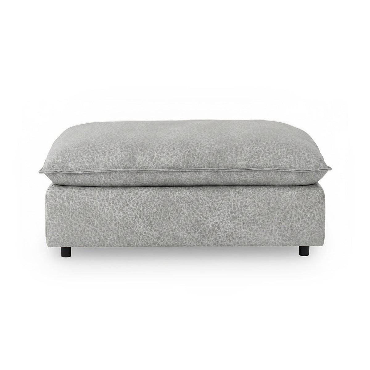 Classic Home Caplan upholstered ottoman with plush fabric and sturdy wooden legs, versatile for living room or bedroom decor.