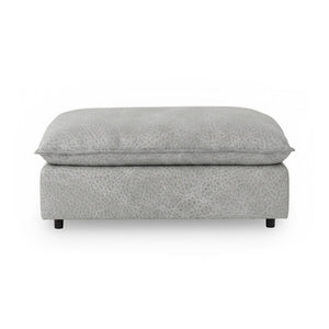Classic Home Caplan upholstered ottoman with plush fabric and sturdy wooden legs, versatile for living room or bedroom decor.