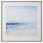 Framed print titled "Surf And Sand" by Uttermost featuring a calming blue ocean scene in a sleek frame.