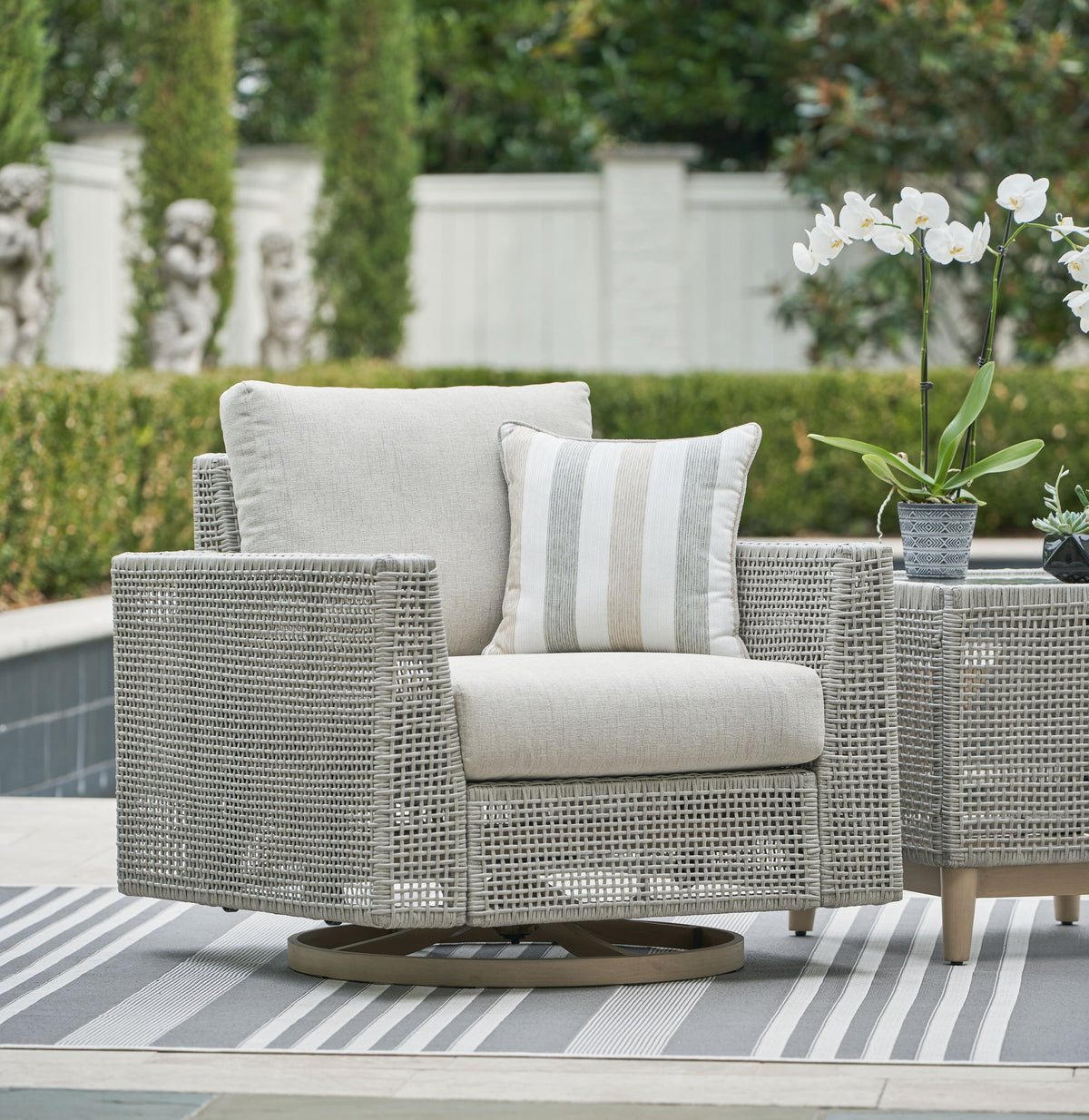 Seton Creek - Swivel Lounge With Cushion - Gray - R&R Furniture Gallery (Fountain Valley, CA)