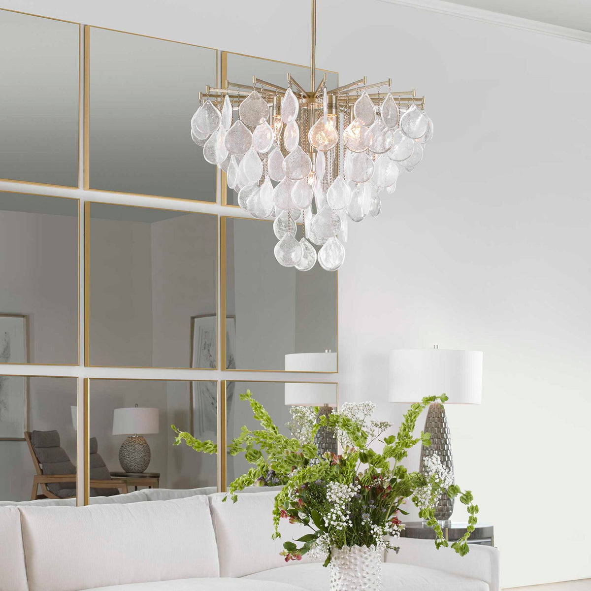 Uttermost Goccia tear drop glass pendant light hanging from ceiling, modern pendant lighting fixture with clear glass design.