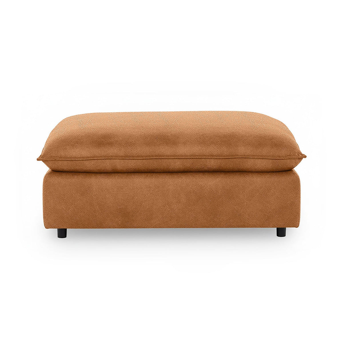 Classic Home Caplan upholstered ottoman with a plush fabric cushion and wooden legs, perfect for living room decor.