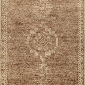 Hand-knotted Cairo area rug by Classic Home featuring intricate traditional patterns in rich colors.