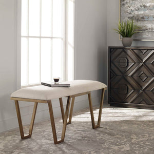 White geometric accent bench by Uttermost, showcasing a modern design with angular lines and sturdy construction.