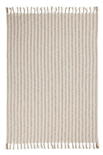 Classic Home Linna 50x70 inch ivory and natural throw blanket draped over a sofa, showcasing soft, cozy fabric and elegant design.