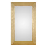 Uttermost Chaney gold wall mirror with a sleek, modern frame, mounted on a wall for stylish home decor.
