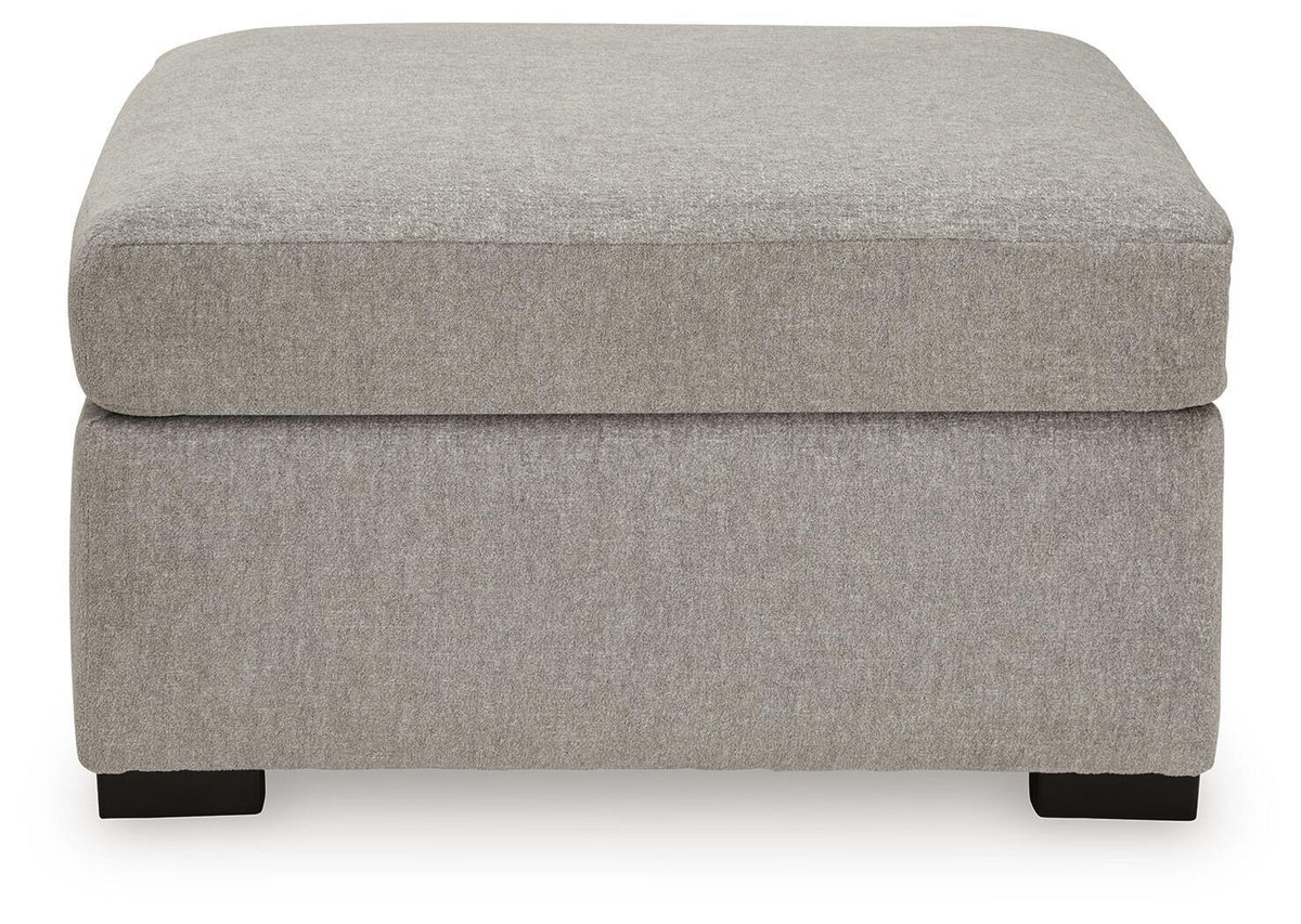 Benchcraft® ModMax Luxe oversized accent ottoman in Flint fabric, featuring a plush, contemporary design for stylish living spaces.