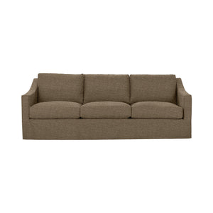 Classic Home Kipton upholstered stationary sofa with plush fabric, featuring a modern design and comfortable seating in a living room setting.