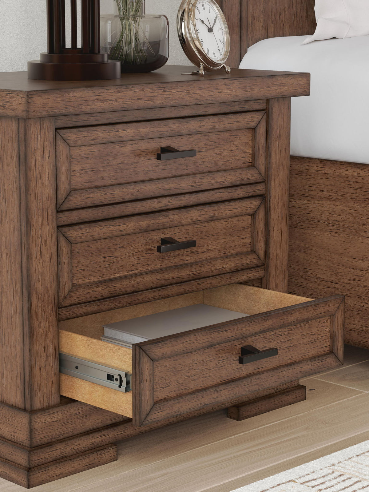 Taffenbrook - Three Drawer Night Stand - Medium Brown