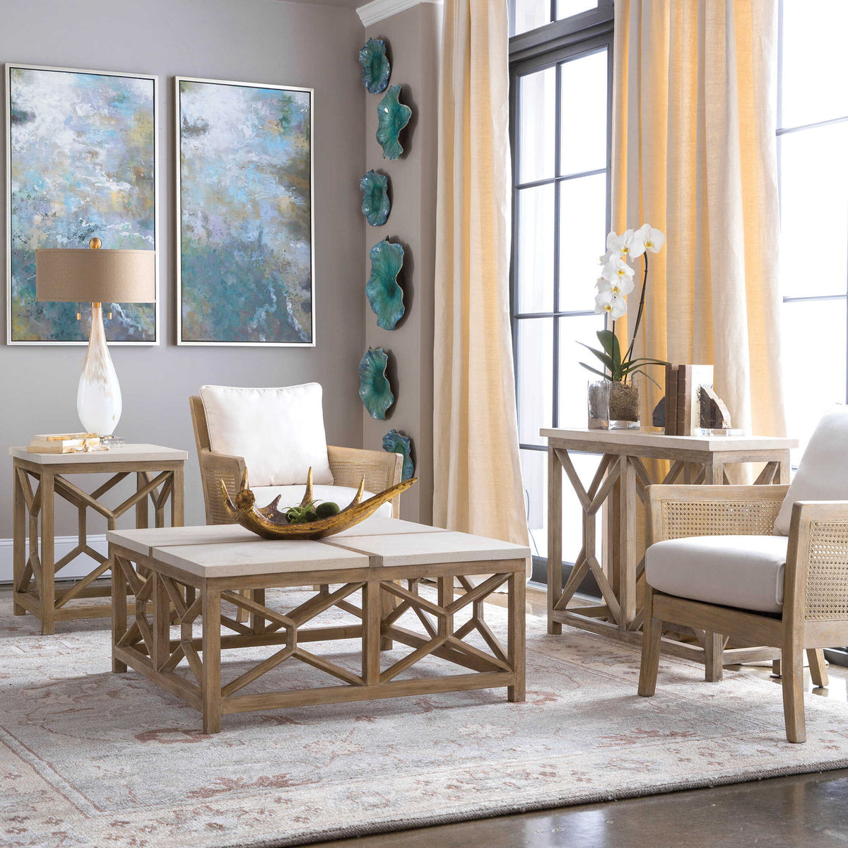 Uttermost Catali stone end table with white and light brown finish, showcasing a sleek, modern design and smooth stone surface.