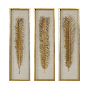 Set of three Uttermost Palma Leaf Shadow Box wall decor in gold with intricate leaf design on textured backgrounds.