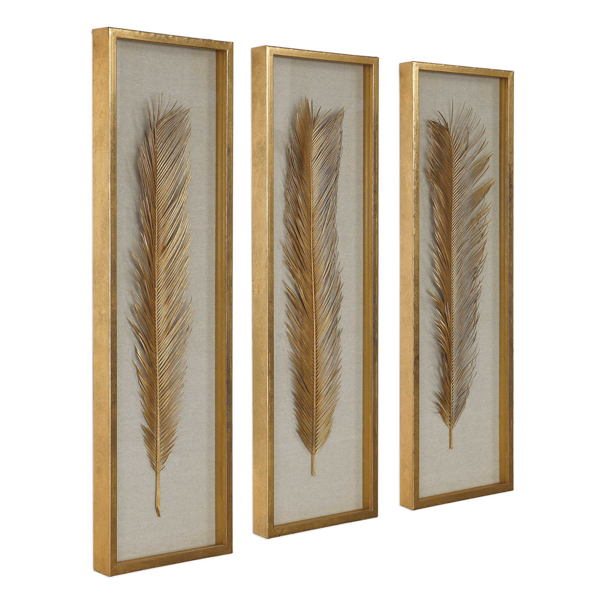 Set of three Uttermost Palma Leaf Shadow Box wall decor in gold, featuring intricate leaf designs for modern home accents.