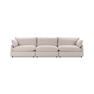 Classic Home Caplan modular sectional in a modern stationary sofa with plush cushions and fabric upholstery.