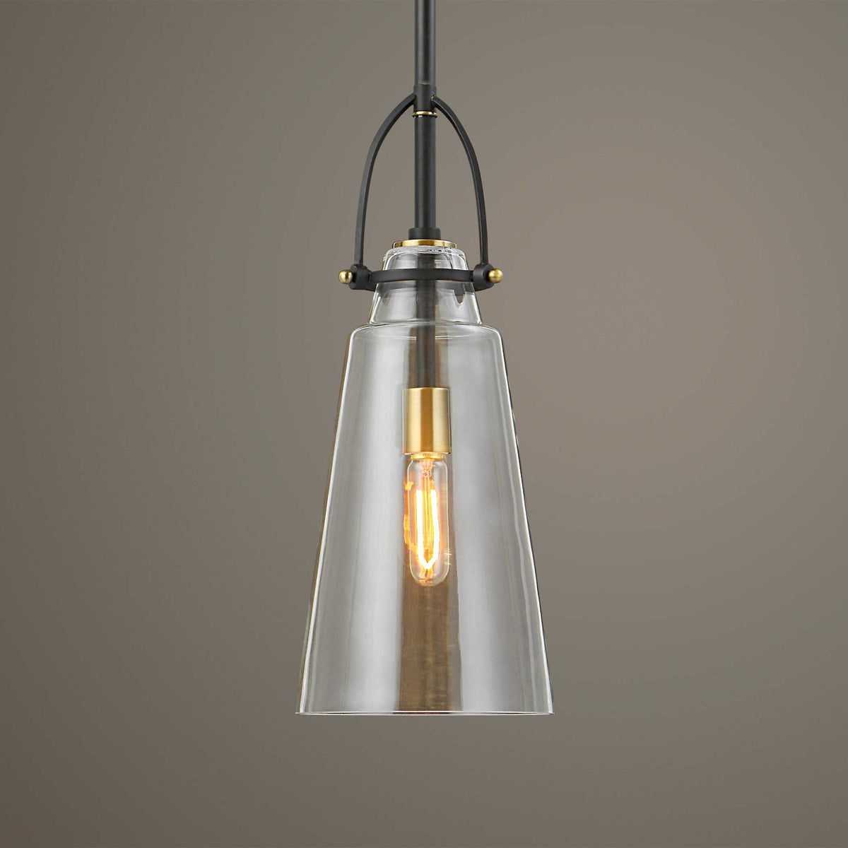 Uttermost Saugus industrial white 1-light pendant lighting fixture hanging with a sleek modern design.