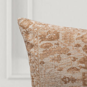 Villa Medley 22-inch accent pillow in Vintage Natural and Amberwood with a textured geometric design