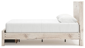 Signature Design by Ashley Lawroy panel bed with built-in storage drawers in a modern bedroom setting.