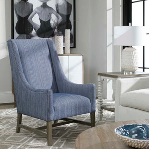 Uttermost Caelina textured white table lamp with cylindrical base and fabric shade, designed for modern home decor.