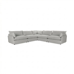 Classic Home Caplan modular sectional sofa with plush cushions and modern design, shown in a stylish living room setting.