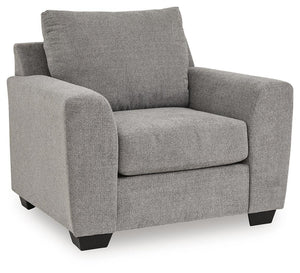 Benchcraft® Loreo arm chair with plush fabric upholstery and cushioned backrest, perfect for living room seating.