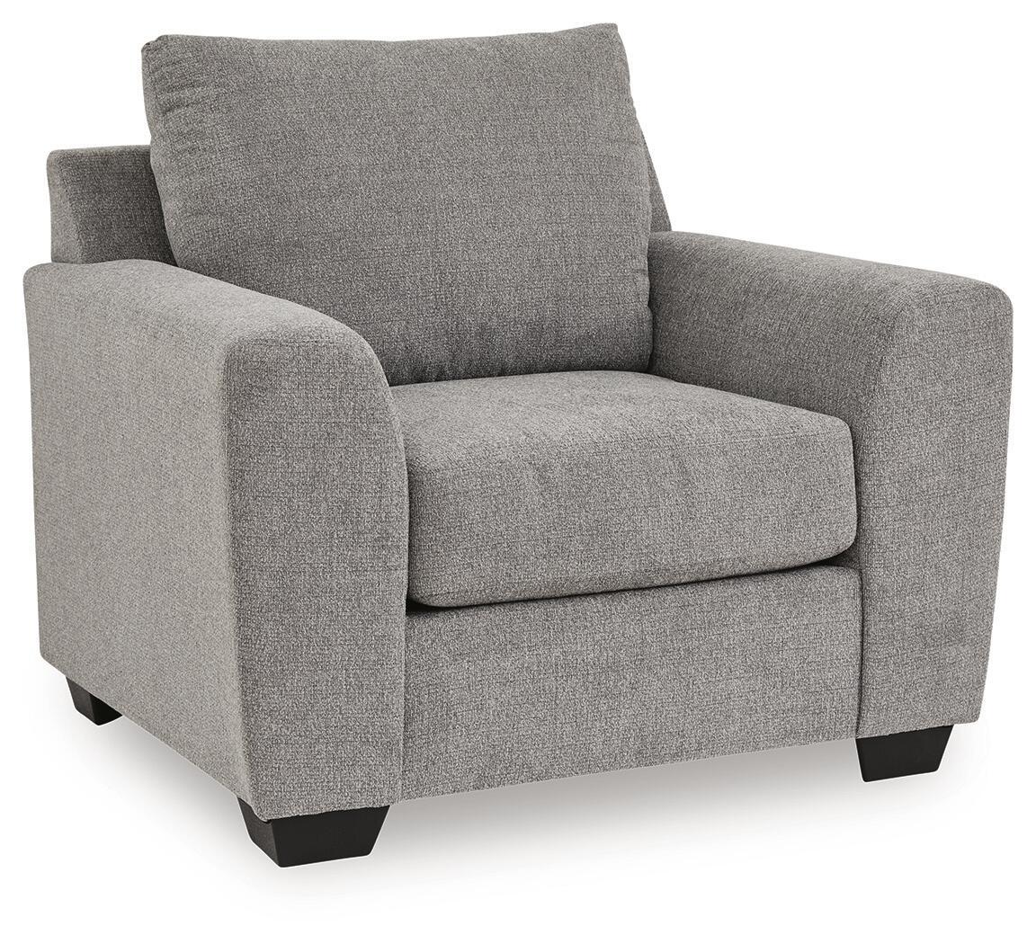 Benchcraft® Loreo arm chair with plush fabric upholstery and cushioned backrest, perfect for living room seating.