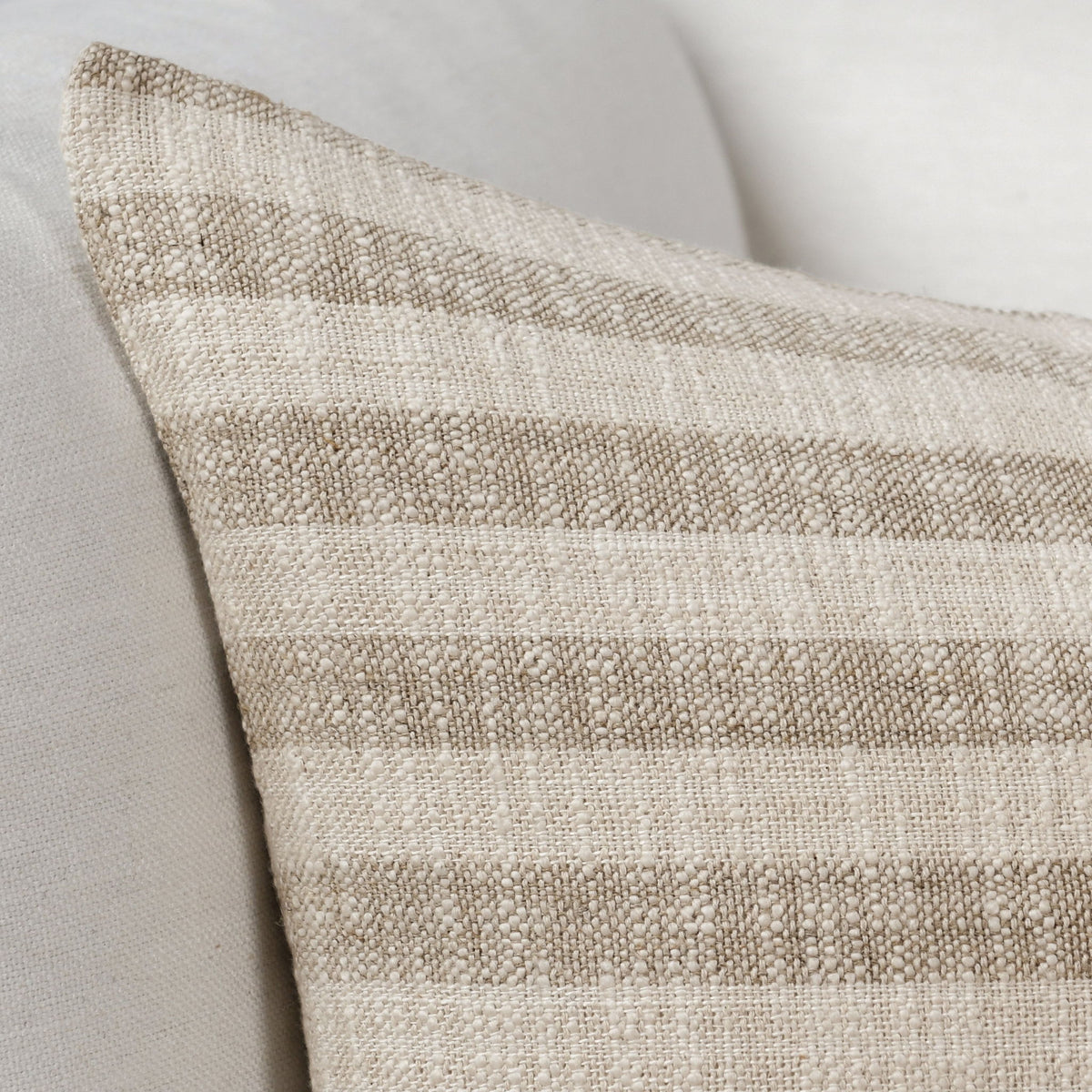 Villa Linna 24-inch accent pillow in ivory and natural fabric