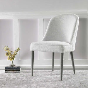 Set of two Uttermost Brie armless chairs with neutral upholstery and modern design, shown from a front angle.