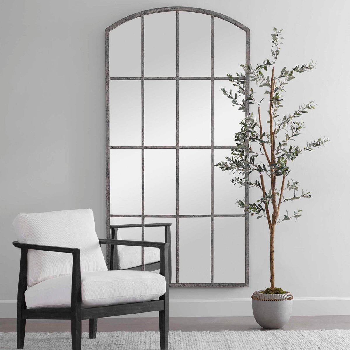 Uttermost Amiel arched wall mirror in ivory with elegant frame, perfect for enhancing interior decor.