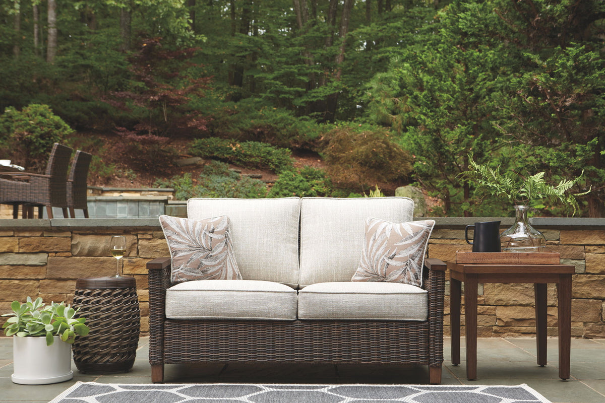 Paradise Trail - Loveseat w/Cushion - Medium Brown - R&R Furniture Gallery (Fountain Valley, CA)