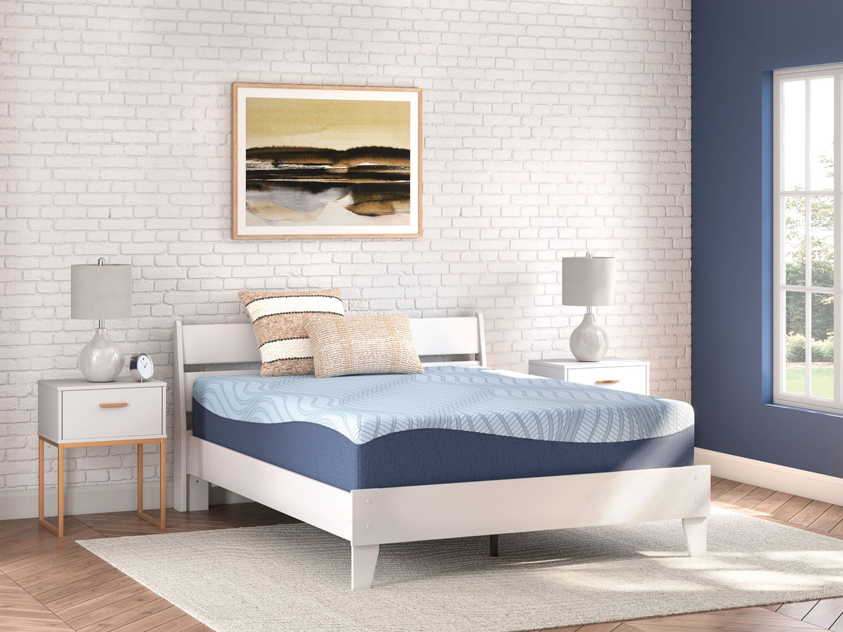 Sierra Sleep® by Ashley Peak 2.0 12-inch memory foam mattress showing plush surface and supportive memory foam layers.